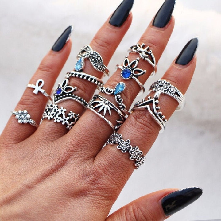 Detailed shot of the elegant silver stackable ring set, highlighting the unique handmade elements.