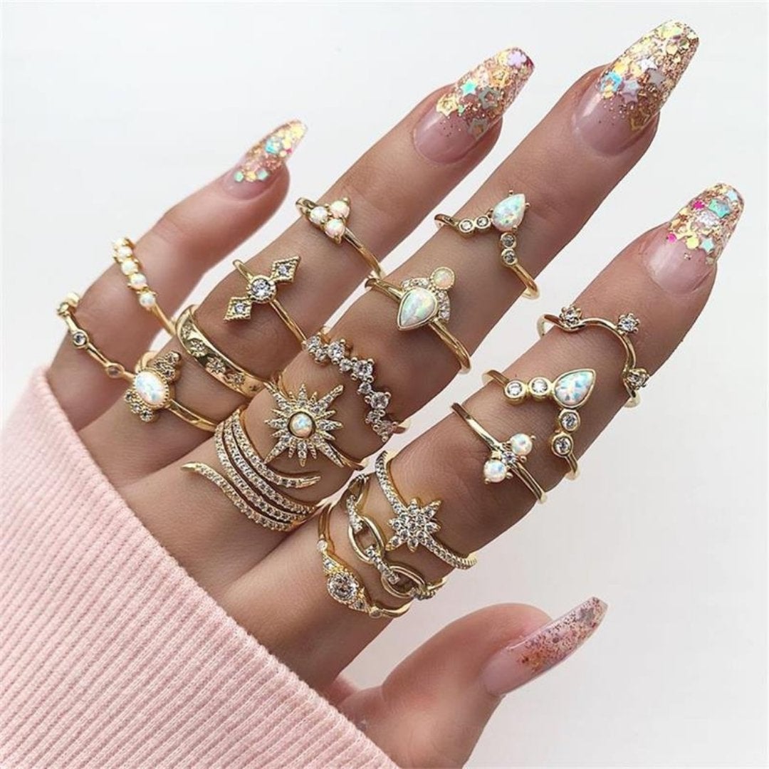 Silver handmade stackable ring set reflecting light, elegant women's jewelry with unique shimmer.