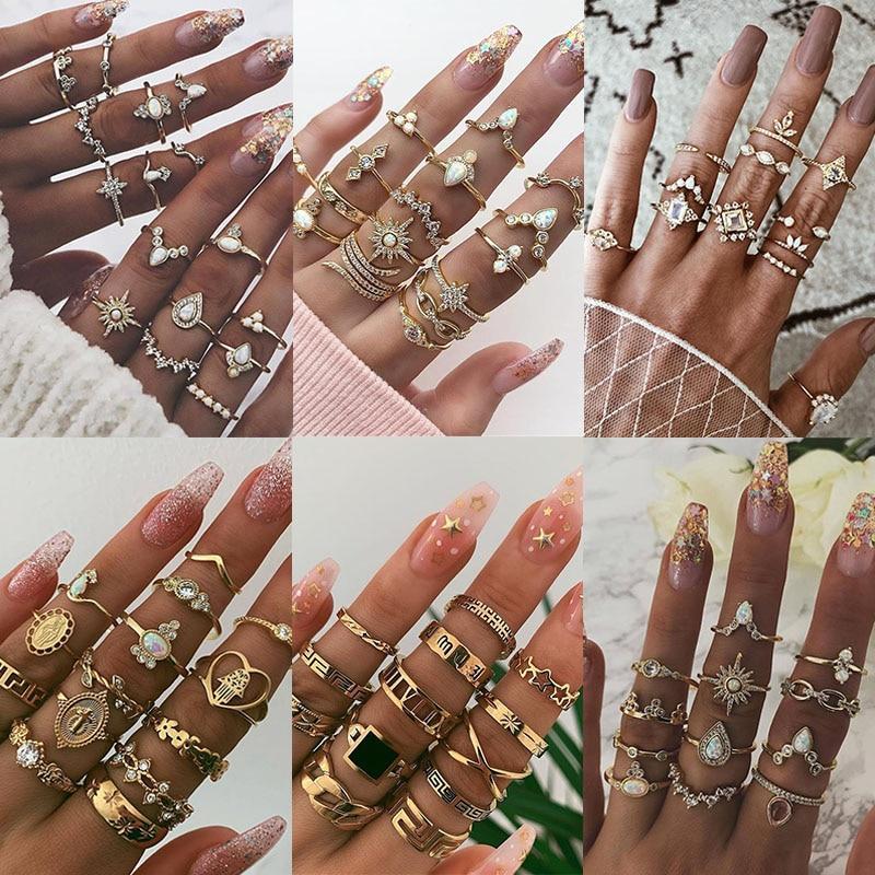 Close-up of handmade silver rings, intricate details, unique women's jewelry stackable set.