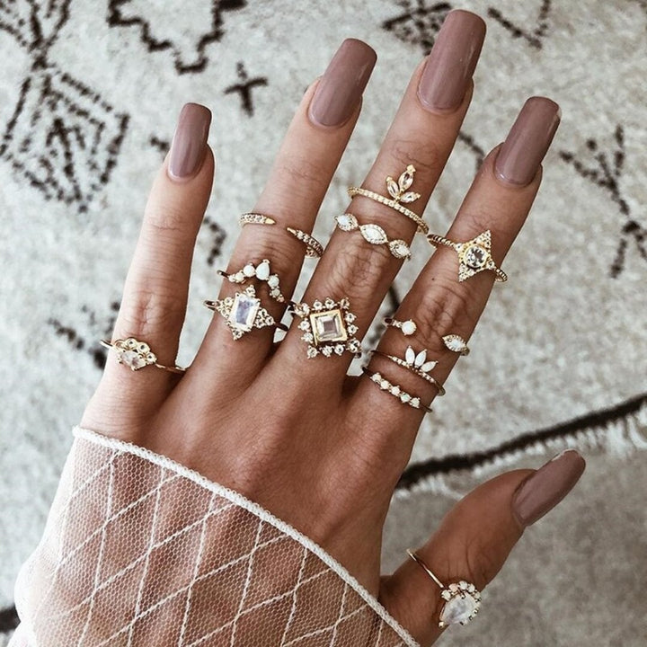 Elegant silver ring set for women, delicate stackable bands, adds a sophisticated touch.