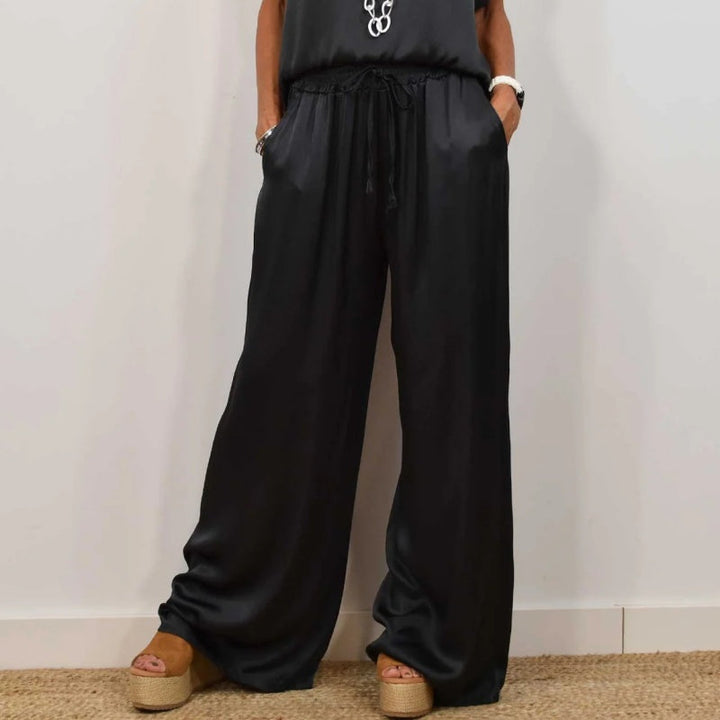 Sophisticated women's heather two-piece set, ideal for effortless casual or dressy elegant style.