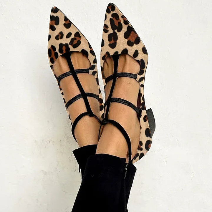 Elegant women's heeled shoes with a stylish leopard print strap. Perfect for parties & chic fashion outfits.