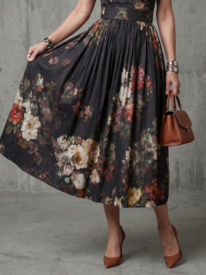 Formal women's pleated midi dress with a stylish high neck, keyhole back, and delicate floral pattern.