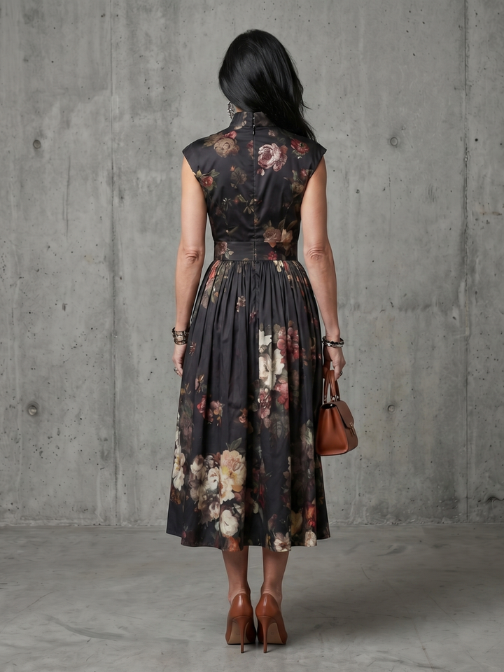 Sleek women's high neck floral pleated midi dress, offering an elegant silhouette for any party or event.