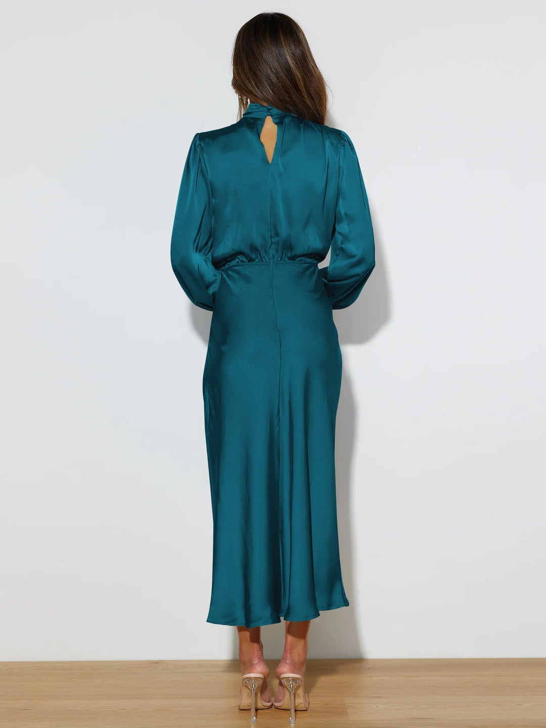 Formal elegant midi dress for women, featuring a high neck and long sleeves. Ideal for evening events.