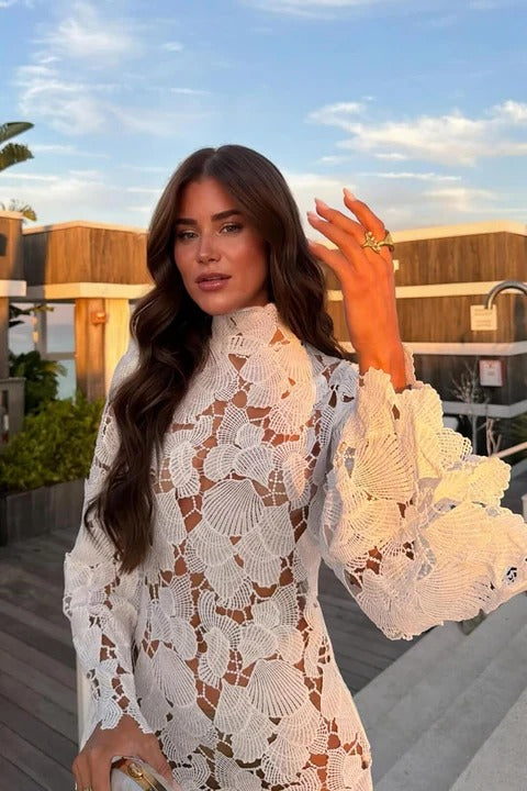 Chic fitted high neck mini dress for women. Ideal as a party, cocktail, or evening dress.