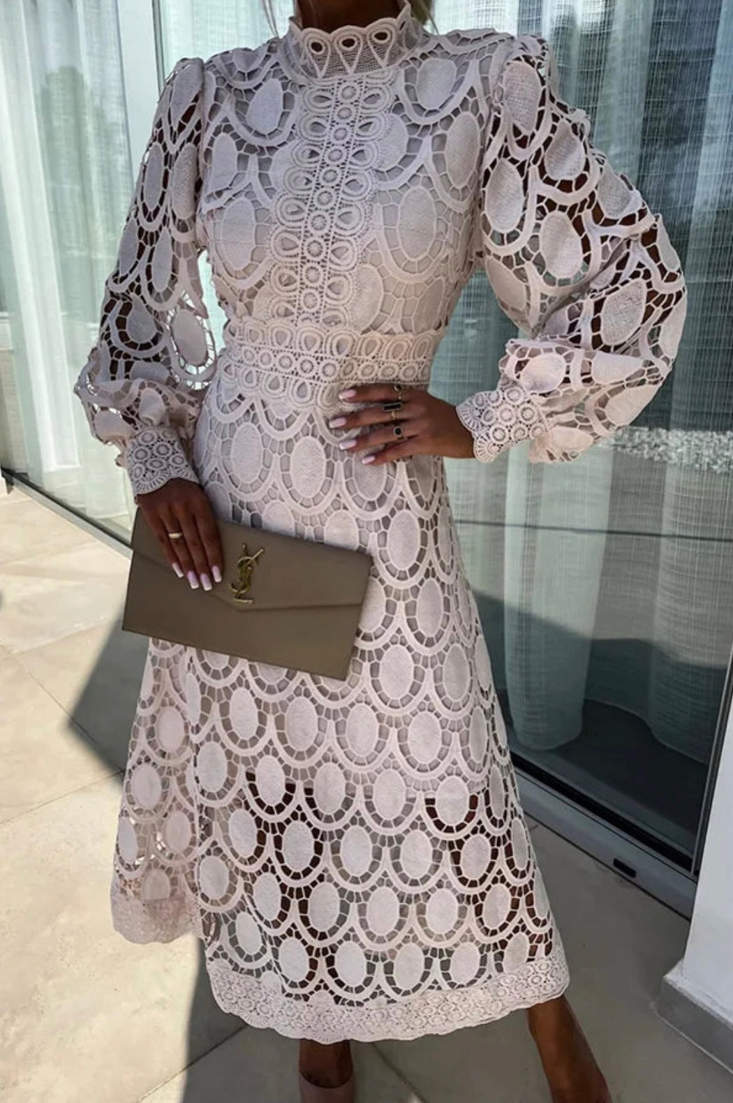 Chic openwork midi dress for women, featuring a stylish high neck and long sleeves. Ideal for parties.