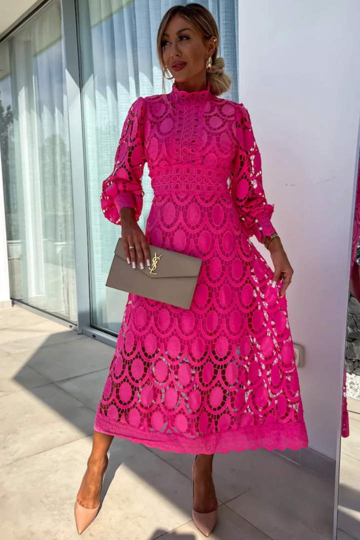 Fashionable women's midi dress. Features high neck, long sleeves, & elegant openwork. Chic party & occasion wear.