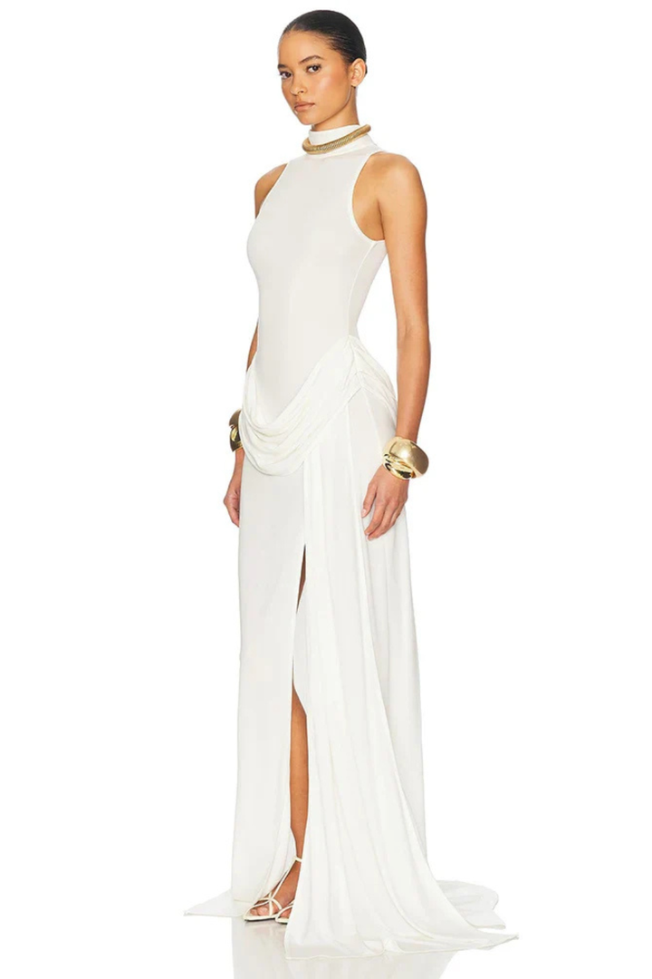 Formal women's high neck sleeveless maxi dress featuring a draped waist and flattering silhouette.