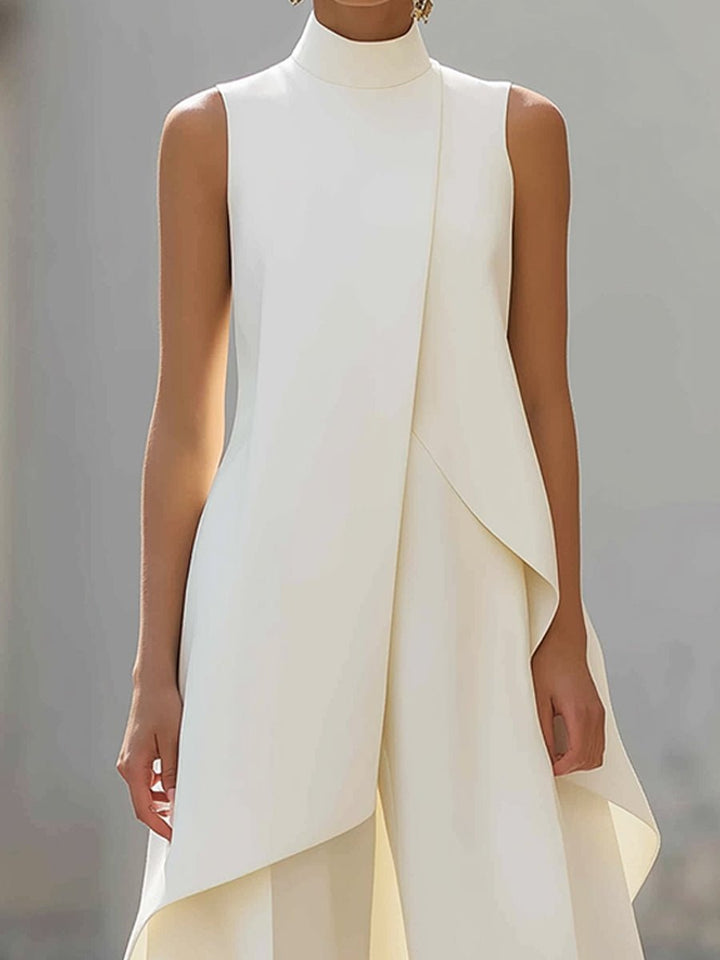 Chic sleeveless high-neck top and wide-leg trousers for women. Modern two-piece suit, perfect for office or events.