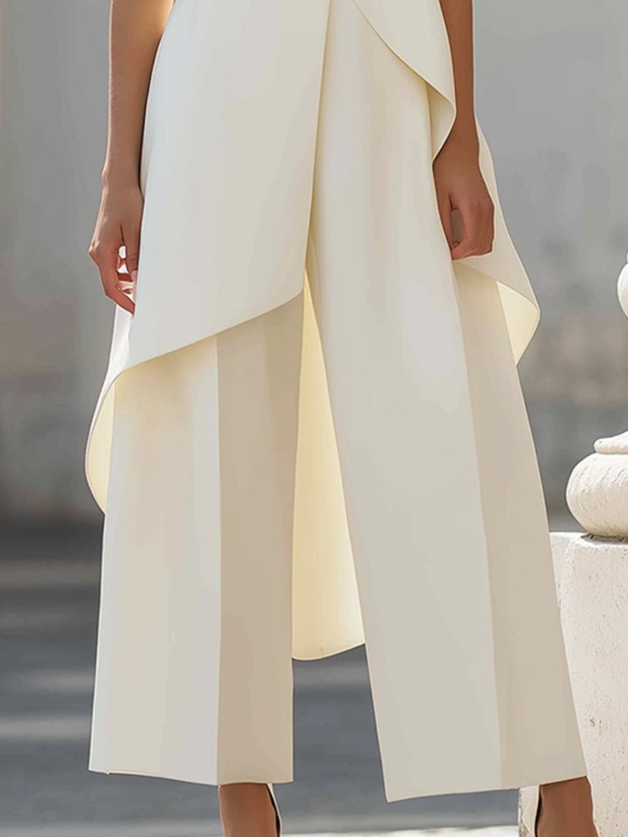 Women's contemporary wide-leg trouser set, featuring a high-neck sleeveless top. Ideal for a modern formal outfit.
