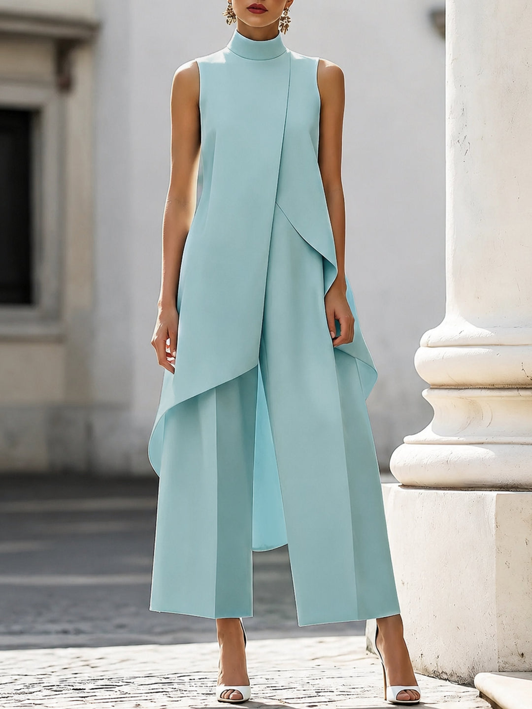 Sleek women's high-neck sleeveless two-piece. Wide-leg trouser set offers a contemporary and elegant formal look.