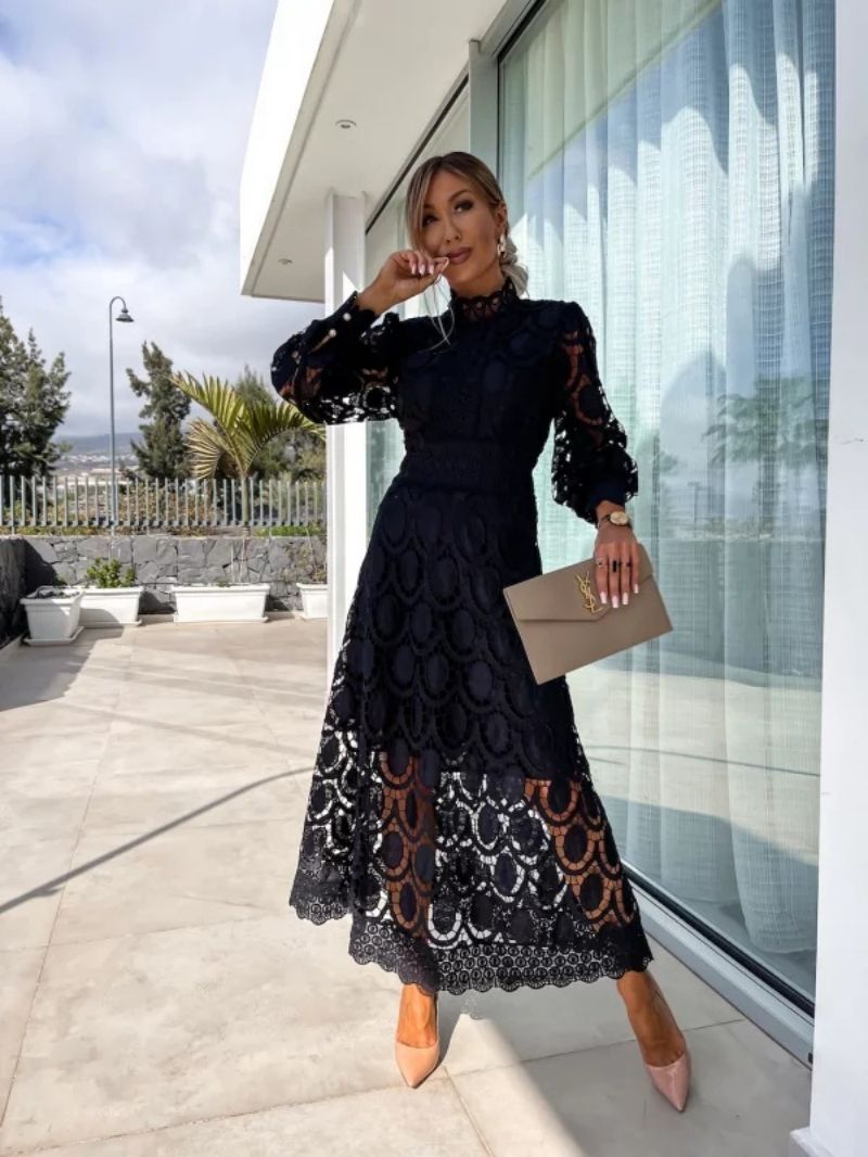 Feminine women's party dress with elegant high-neck, airy puff sleeves & lace details. Ideal for summer occasions.