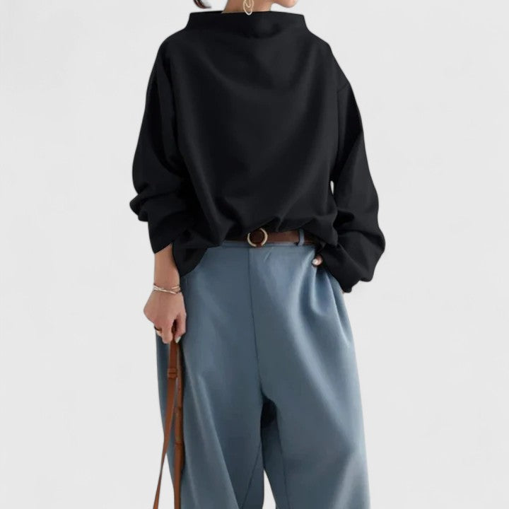 Soft, comfortable women's high-neck top. This elegant long sleeve blouse offers a classic and chic versatile style.