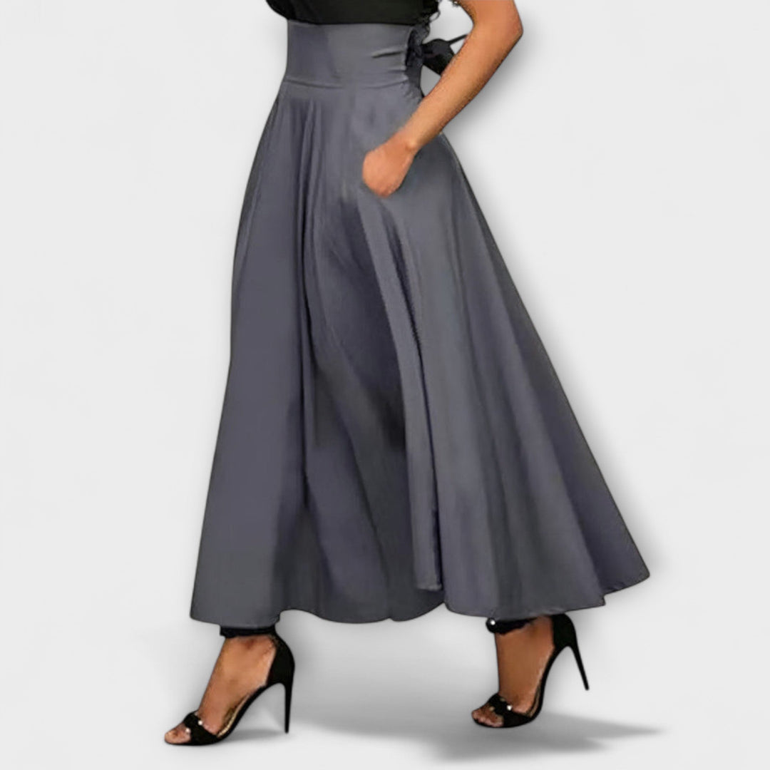 Versatile high-waist long maxi skirt for women, ideal for parties, office, or chic everyday style.