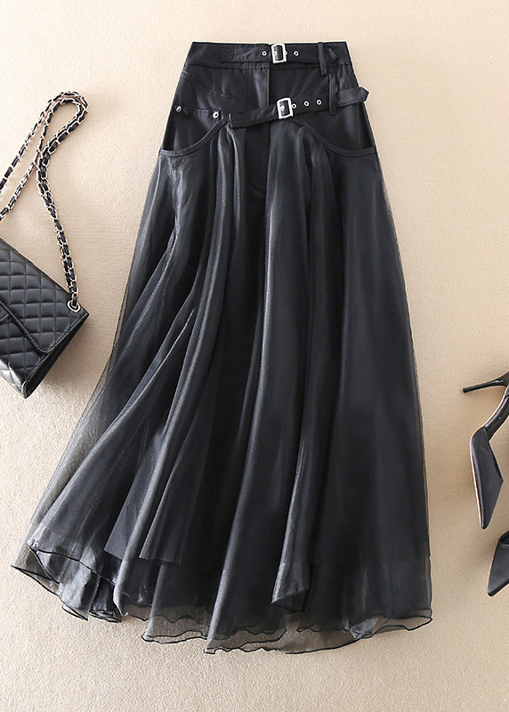 Elegant women's high waist mesh skirt in flowing black fabric, perfect for evening wear & special occasions.