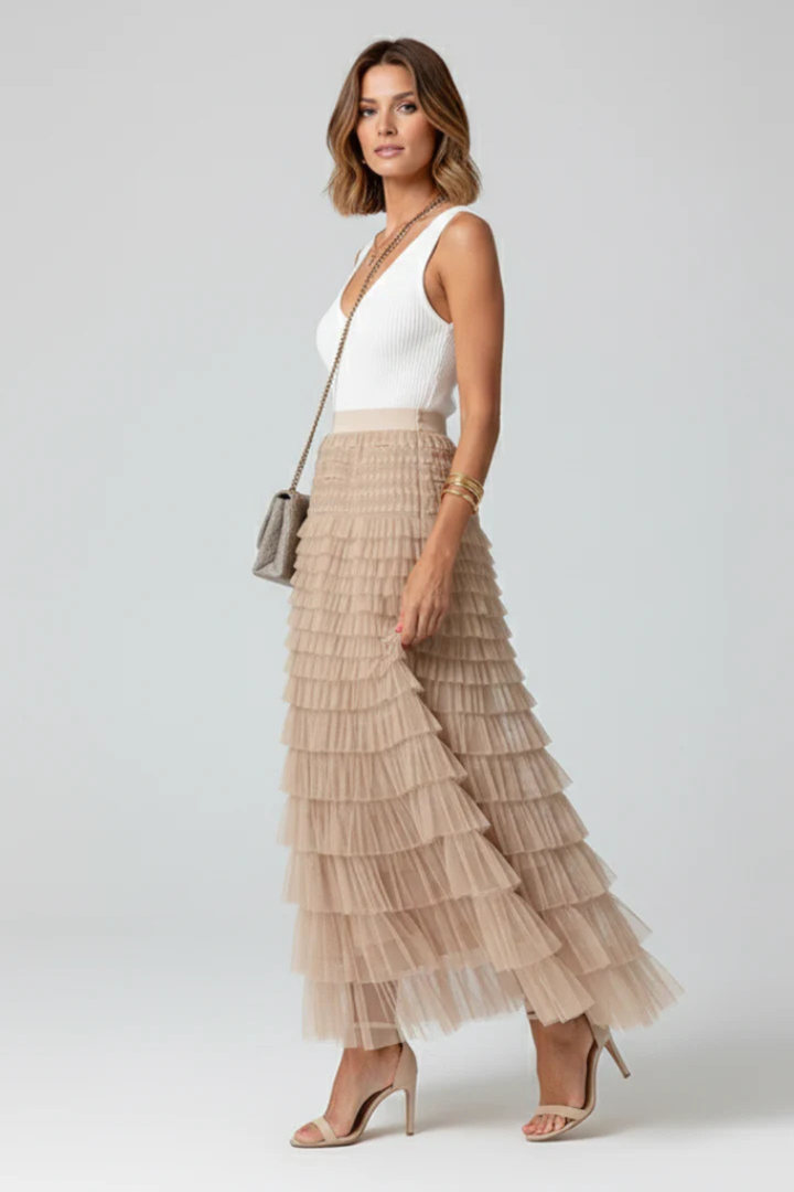 Flowing women's layered midi skirt, elegant high-waist design in beige, ideal for special occasions.