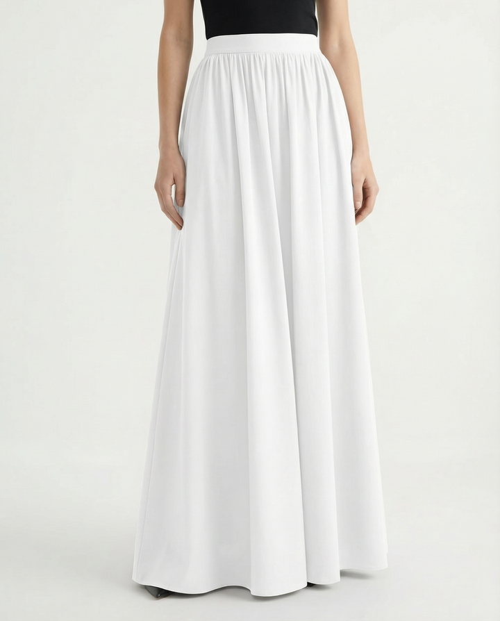 Essential women's high-waisted flowing skirt, elegant midi length for a versatile and chic wardrobe staple.