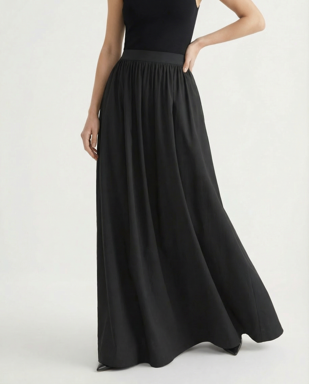 Professional women's high-waisted flowing skirt, an elegant choice for office wear or business casual.