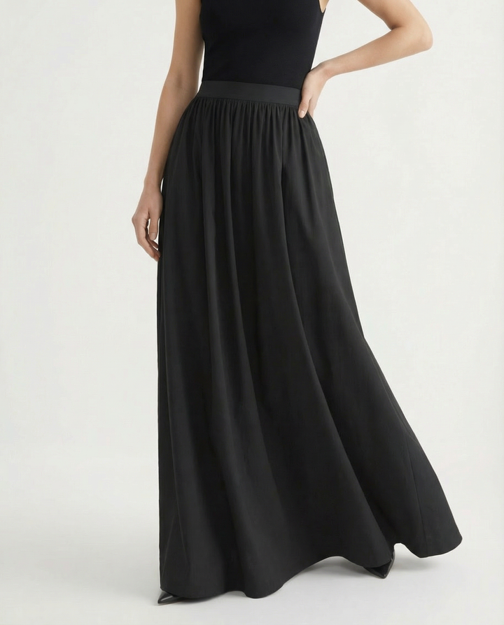 Professional women's high-waisted flowing skirt, an elegant choice for office wear or business casual.