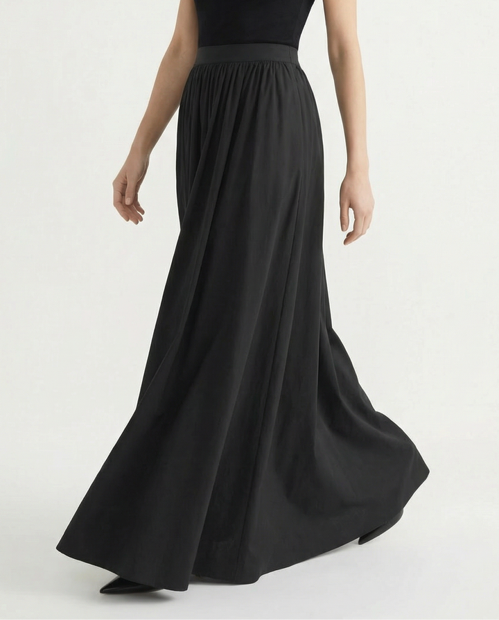 Casual chic women's high-waisted flowing midi skirt, offering versatile style for everyday elegance.