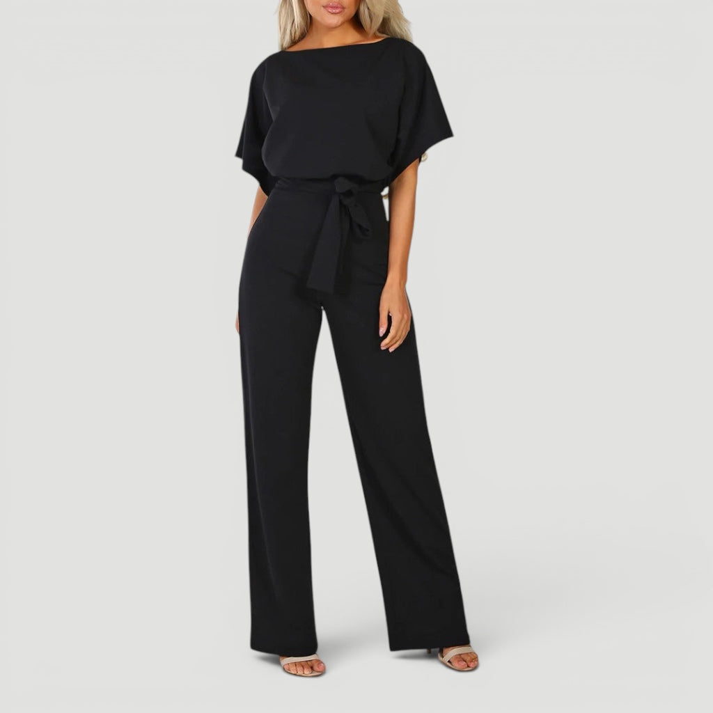 Summer style women's high waisted wide leg jumpsuit, a flowy and elegant one-piece for sophisticated looks.