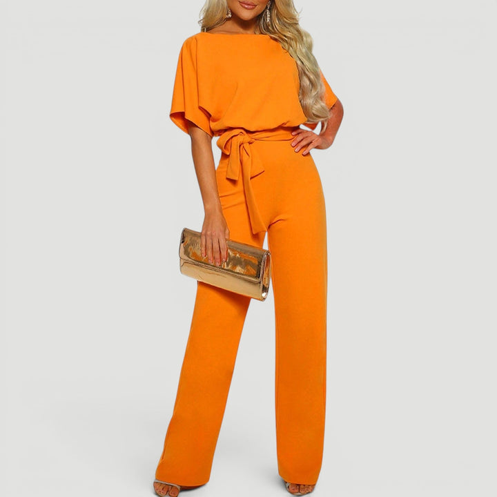 Flowy wide leg jumpsuit for women, high waisted, a comfortable and elegant one-piece summer style outfit.