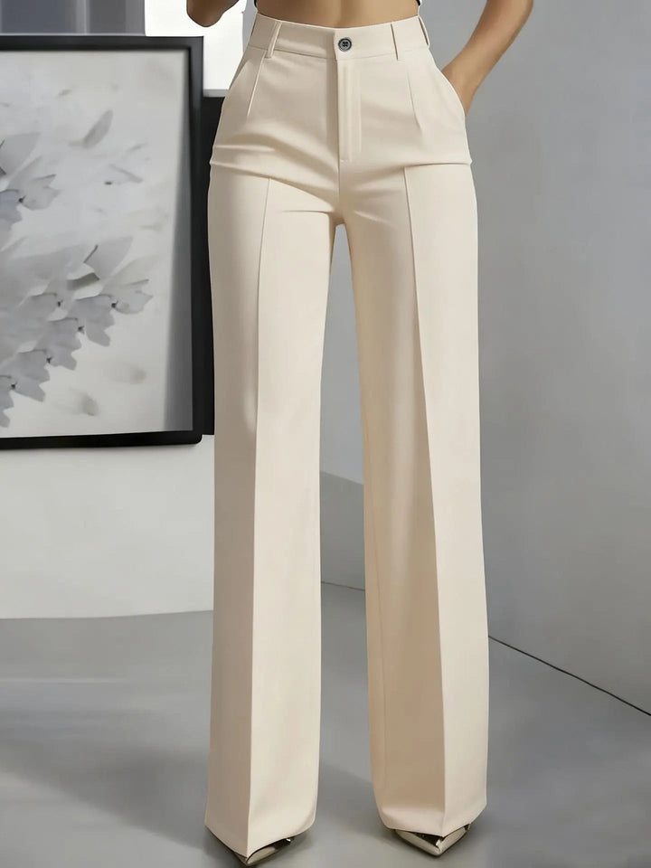 Chic women's tailored wide leg trousers, high waisted with sophisticated front pleats for an elegant look.