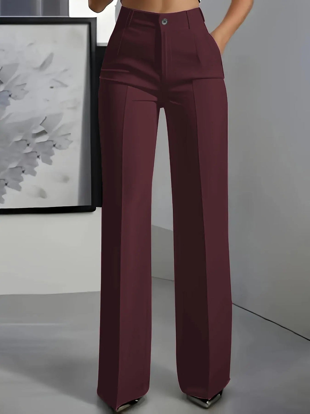 Professional women's office wear trousers; high waisted, wide leg & front pleats for a sharp, modern style.