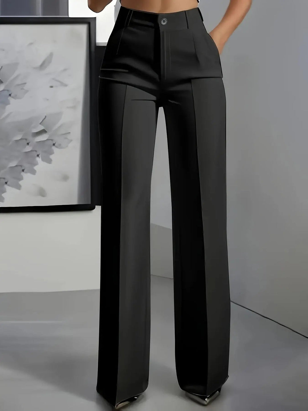 Fashionable high waisted wide leg trousers for women. Front pleats add a refined, versatile touch.