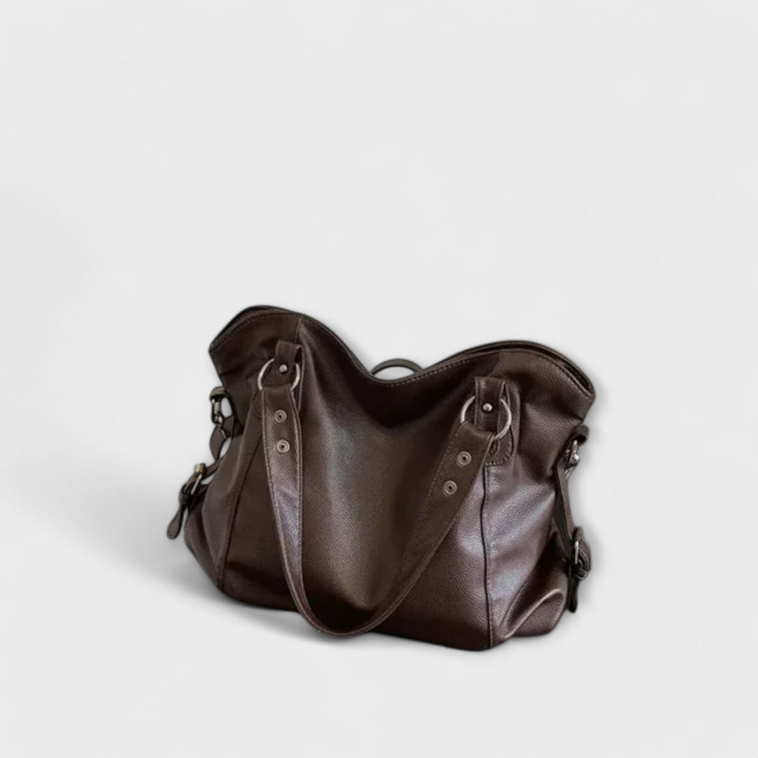 Modern women's hobo shoulder bag, combining elegance with versatile styling options.