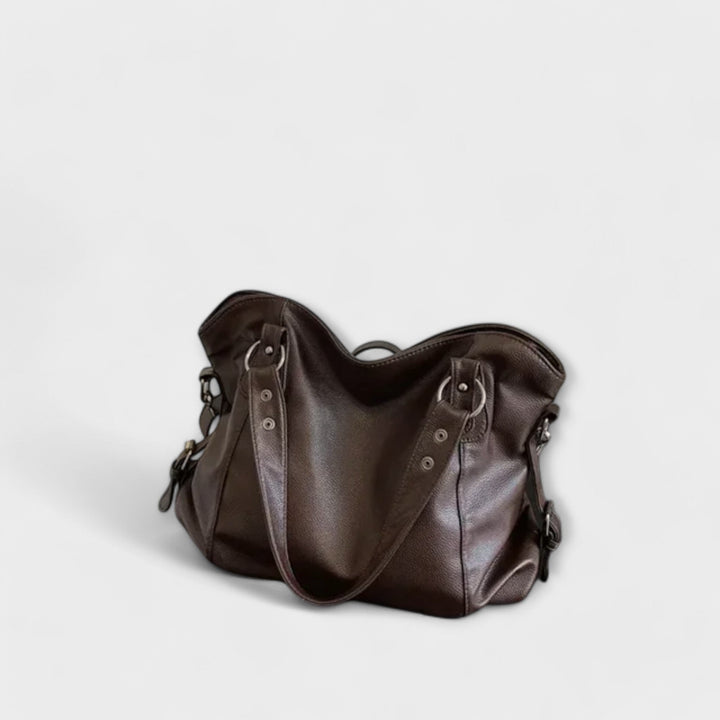 Modern women's hobo shoulder bag, combining elegance with versatile styling options.