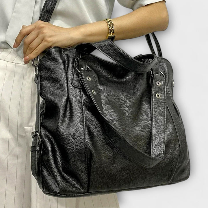 Fashionable women's hobo bag, designed for shoulder carry, a truly versatile statement.