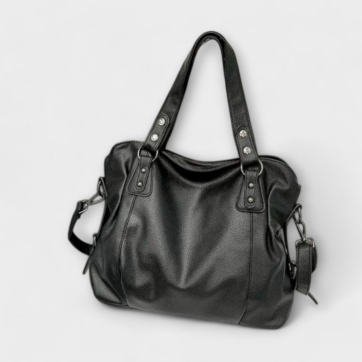 Versatile women's hobo shoulder bag, providing elegant style and practical function.