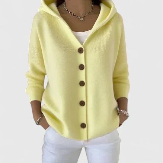 Stylish women's long sleeve hooded button-down cardigan. Perfect elegant layering piece for fall fashion.