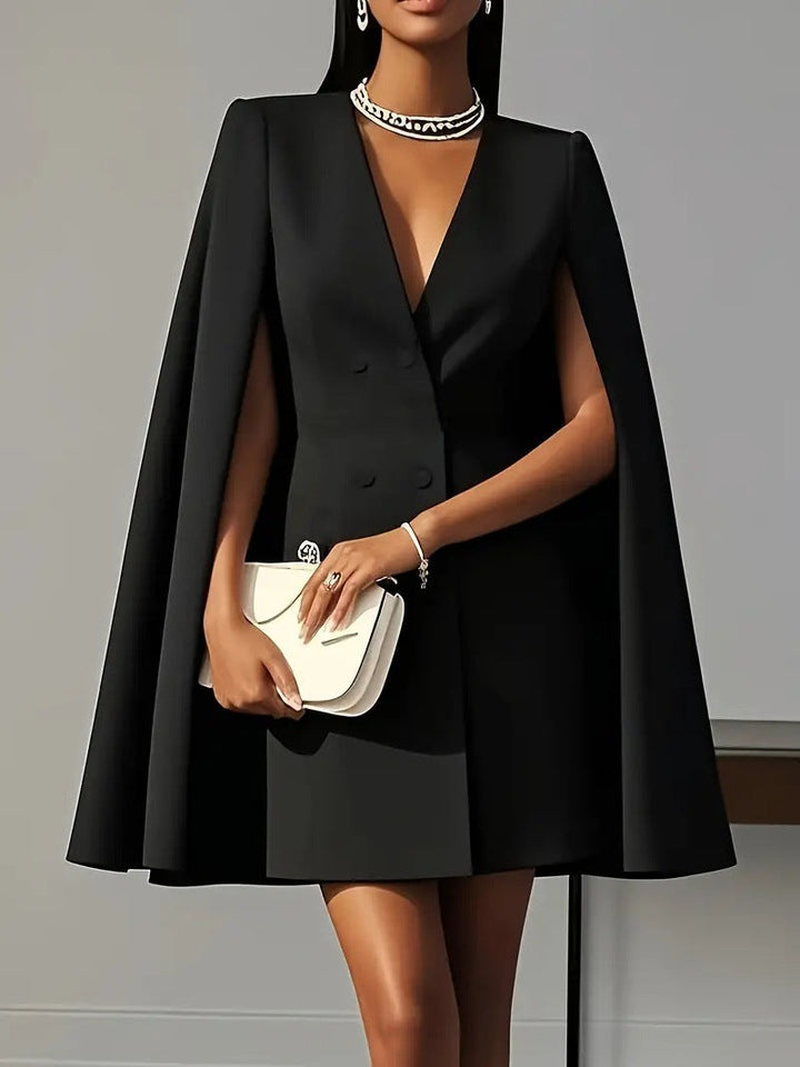 Fashionable women's evening cape dress, featuring a unique hood for an elegant & distinctive party look. Formal.