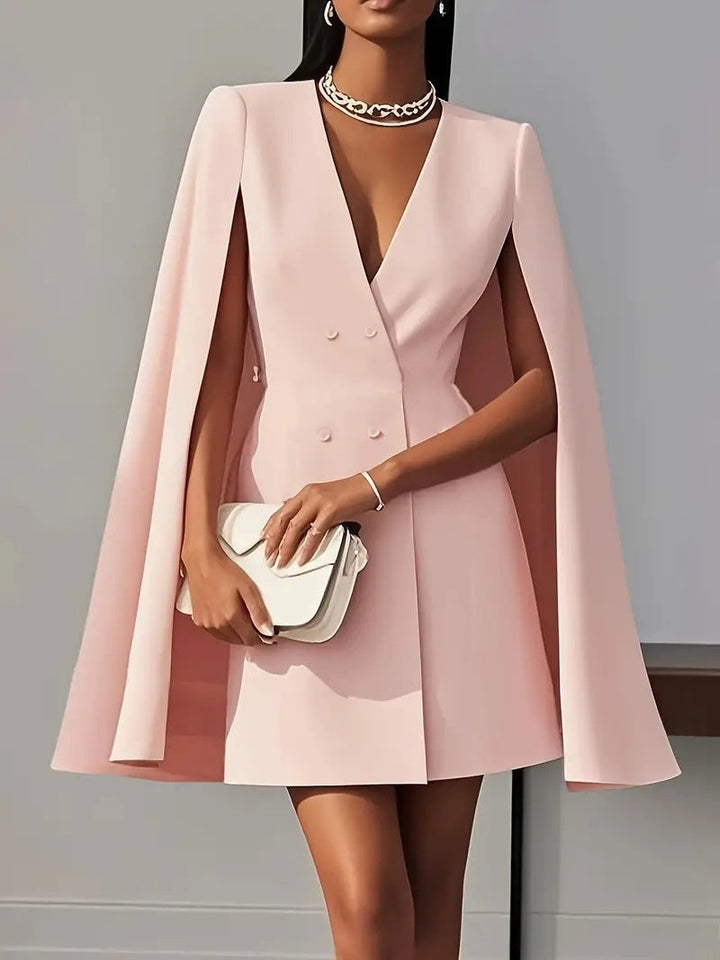 Sophisticated women's hooded cape dress, offering an elegant silhouette for formal events & stylish party wear.