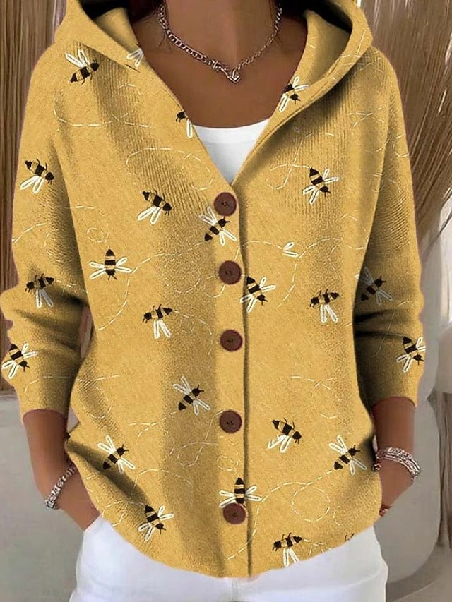 Versatile women's button hooded jumper for cozy layering. Comfortable knitwear, ideal for fall & winter outfits.