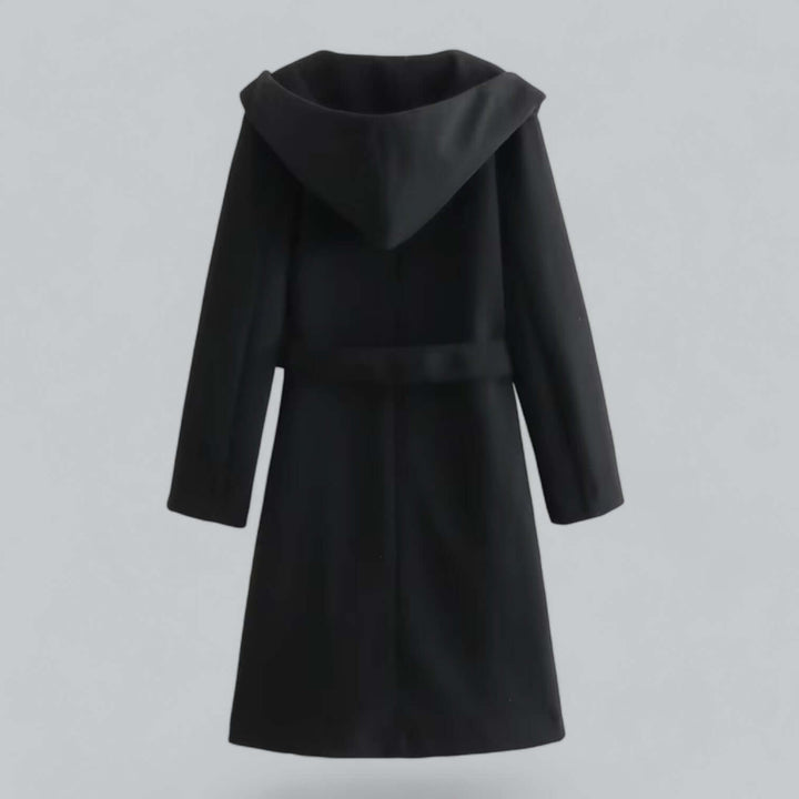 Fashionable women's long trench coat with a flattering silhouette and deep hood for winter style.