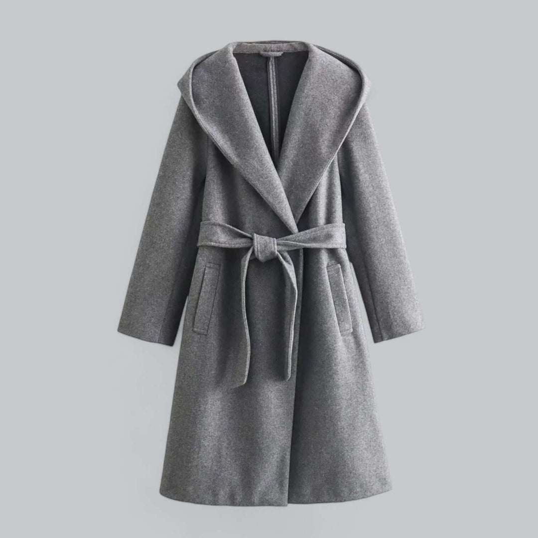 Classic women's hooded long trench coat, designed for warmth and style during cooler seasons.