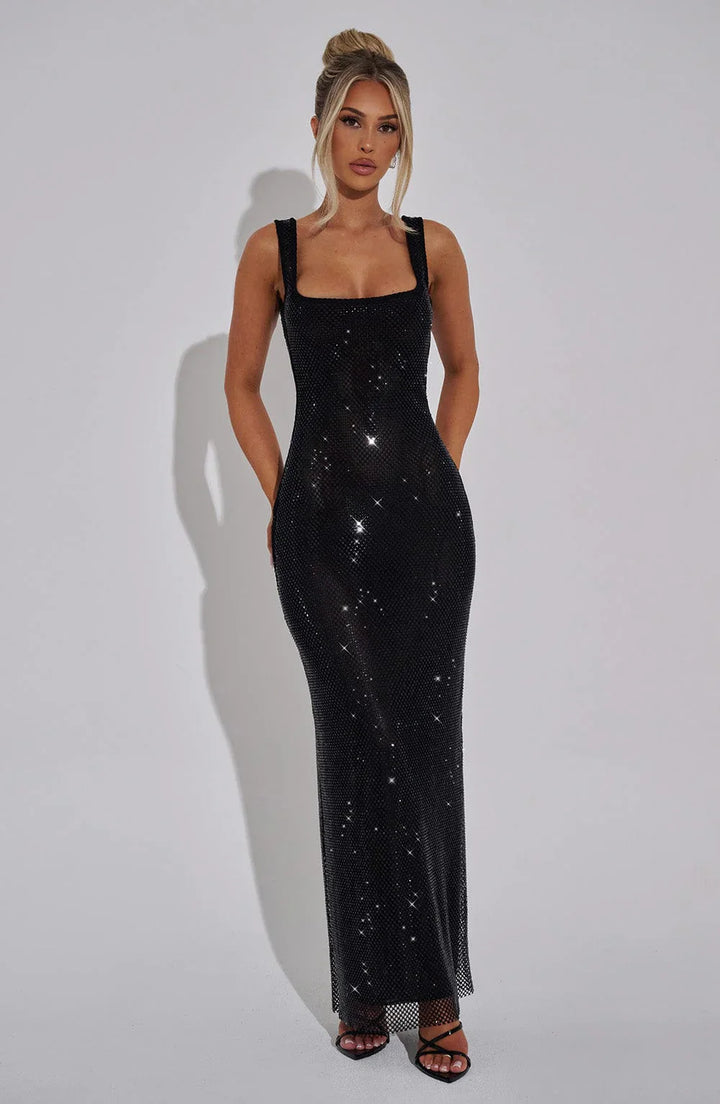 Sophisticated hourglass fitted maxi dress for women's formal events. Elegant evening wear, luxury style.