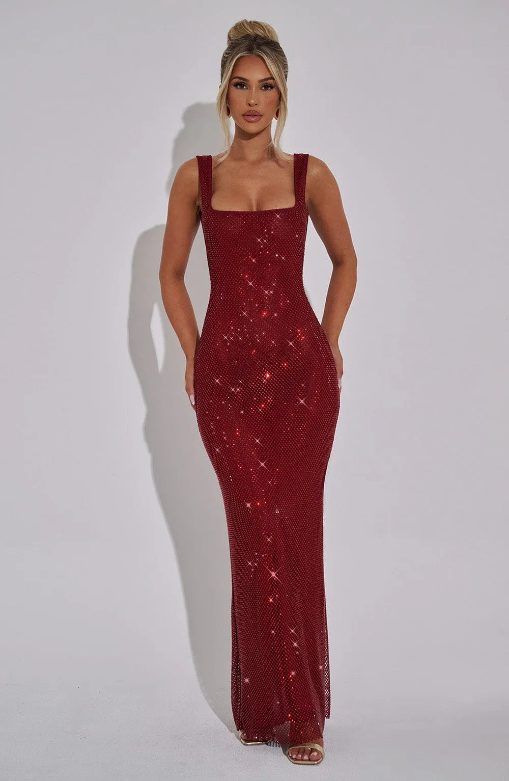 Women's formal fitted evening dress, showcasing an elegant hourglass silhouette. Perfect for luxury events.