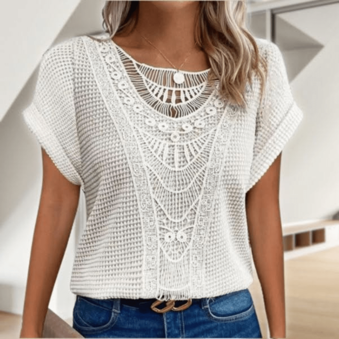 Boho chic women's flowy top with round neck for summer vacation wear. Relaxed fit & stylish comfort.