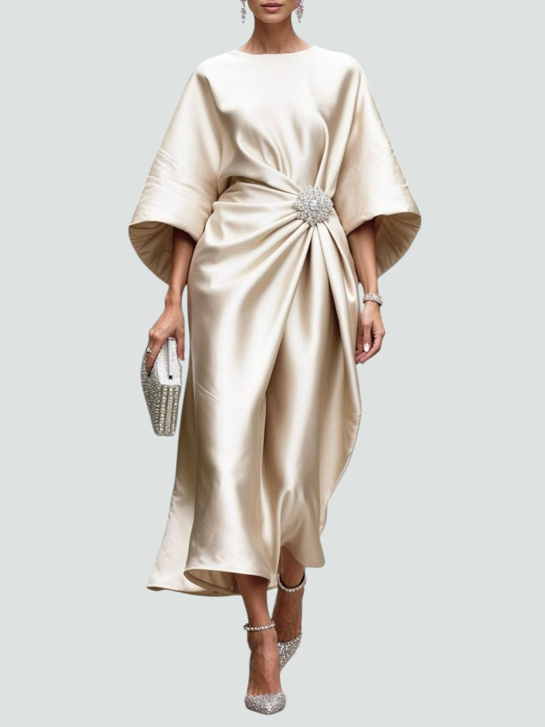 Women's elegant party midi dress with graceful kimono sleeves and a shimmering crystal brooch, ideal for events.