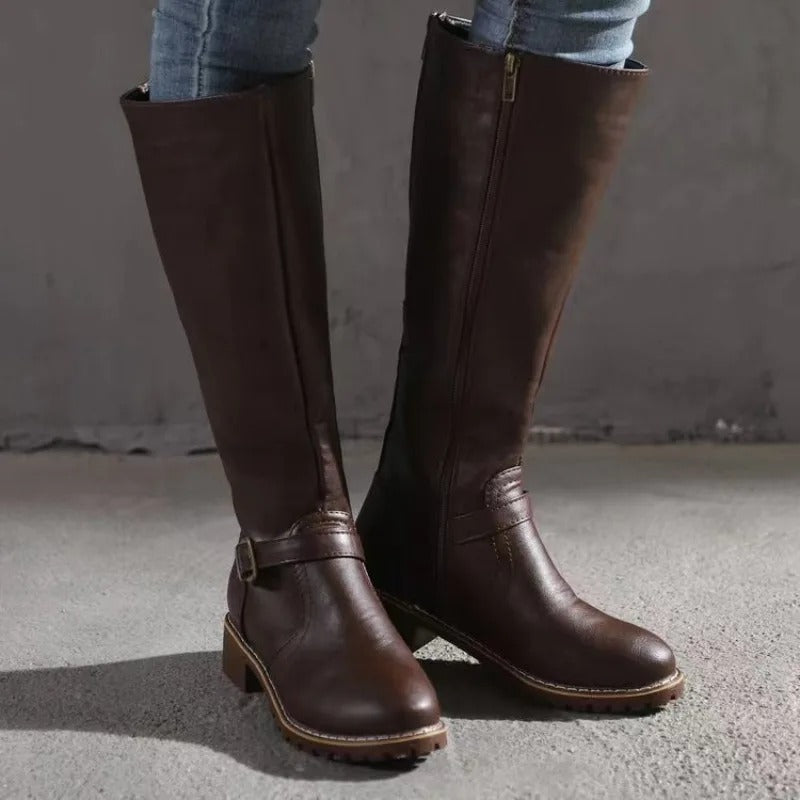 Sleek women's knee-high boots, elegant & classic. Zipper tall boots for stylish fall/winter fashion.