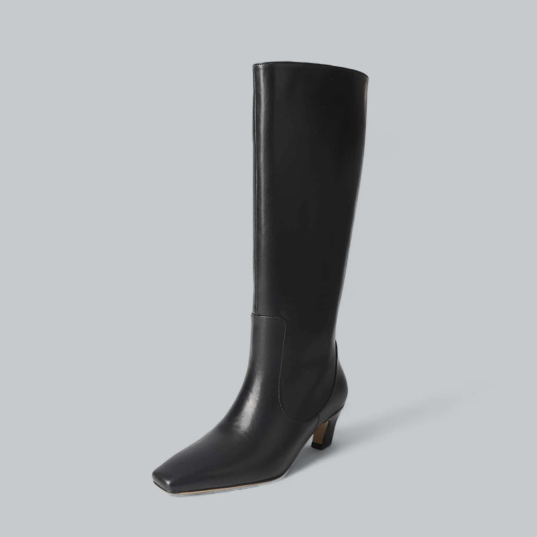 Elegant women's knee-high boots, perfect for sophisticated and timeless style. Comfortable heel boots.
