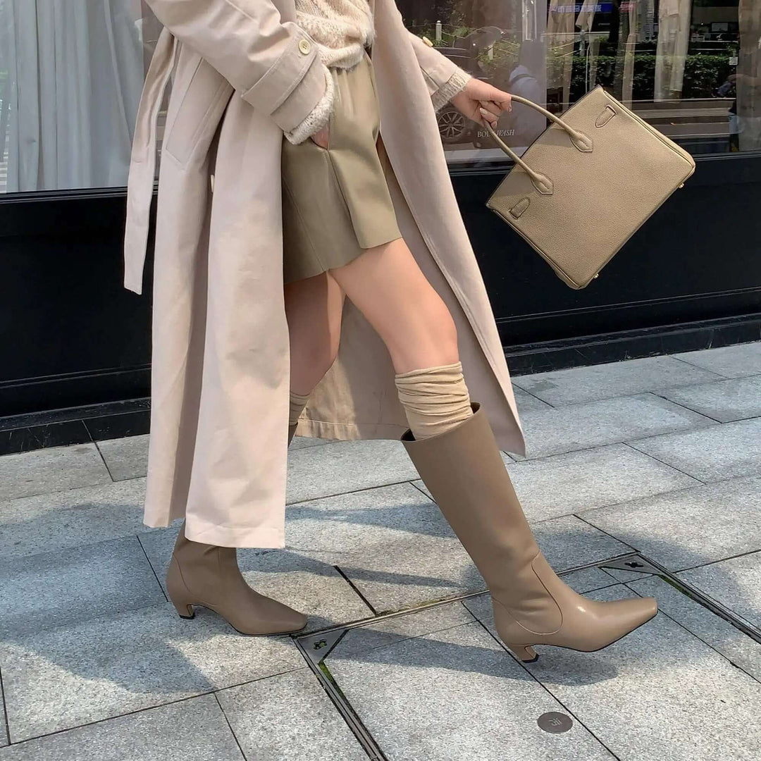 Chic women's knee-high boots, combining comfort with an elegant, versatile, and stylish design for any occasion.
