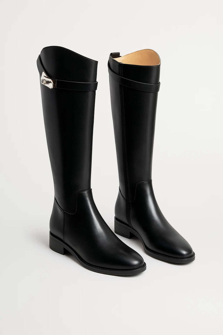 Elegant women's knee-high boots with buckle detail, perfect for classic autumn & winter fashion. Timeless tall ladies' footwear.