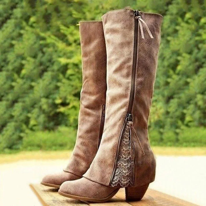 Elegant women's knee-high boots with side zip & delicate lace detail, perfect for fall fashion. Comfortable block heel.