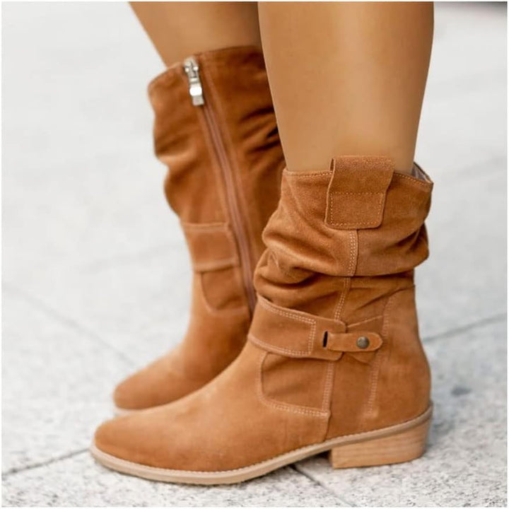 Classic women's knee-high boots, featuring a comfortable block heel & decorative strap. Ideal for winter style.